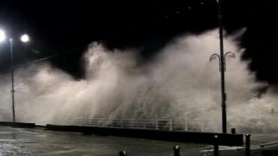 Waves crash on seafront of Aberystwyth