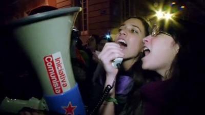 Two women with megaphone