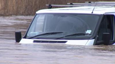 Van caught in floods in Essex