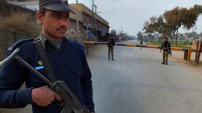 Pakistan police guard scene of militant attack. 19 Jan 2014