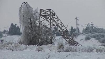 Collapsed pylon in snow