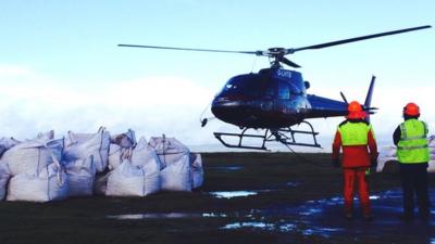 Helicopter flying stones to Offa's Dyke