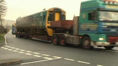 Train is moved by lorry
