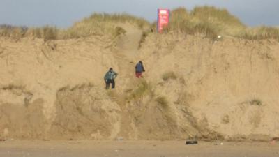 Warning signs at Cefn Sidan