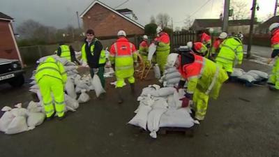 Sandbags are prepared