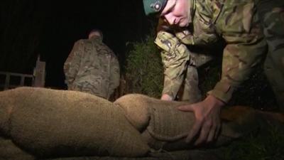 Marines laying sandbags in Somerset