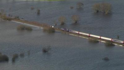 Train surrounded by water