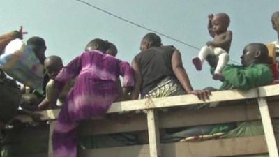 Muslims climb into truck in Bangui