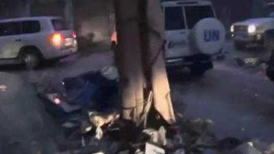 UN vehicles in Homs