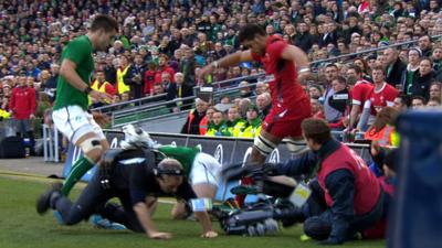 Taulupe Faletau runs into cameraman