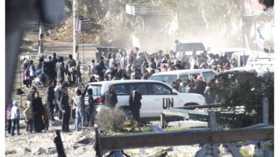 Syrians flee Homs