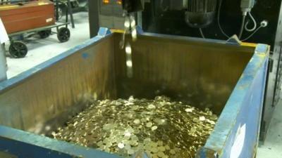 Coins being produced