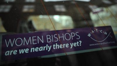 Banner advocating female bishops