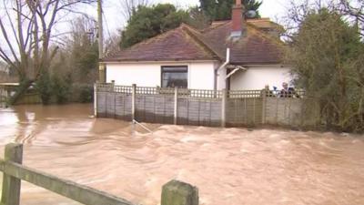 Floods around a house