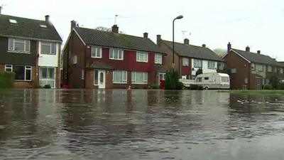 Houses surrounded by floodwater