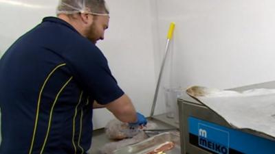 Rugby player in kitchen