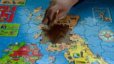 Jigsaw map with Scotland being removed