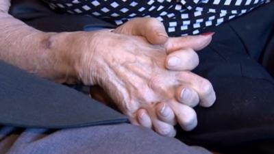 Harold Gough and Mary Shingler holding hands