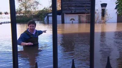 Jon Kay in floodwaters in Somerset