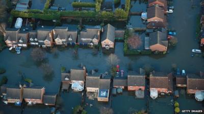 Houses in Staines-upon-Thames are inundated with flood water