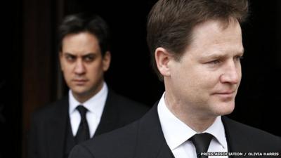 Deputy PM and Lib Dem leader, Nick Clegg, with Labour leader Ed Miliband in background