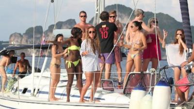Expats having fun on a boat