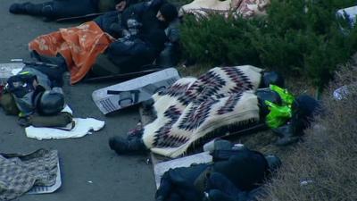 Police sleep in Independence Square