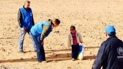 UNHCR image of little Syrian boy Marwan apparently 'alone' in the desert