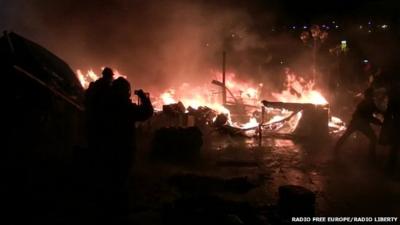 A still from amateur footage shows the firey centre of the Kiev protests