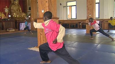 Children practising kung fu