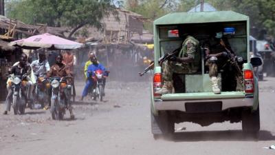 Joint Military Task Force patrolling the streets of the restive north eastern Nigerian town of Maiduguri