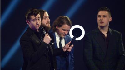 The Arctic Monkeys collecting their award for Album of the year