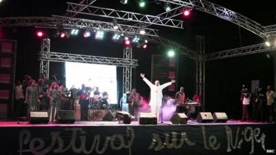 Group on stage at Festival sur le Niger in Segou, Mali, 2014