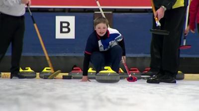 Youngsters taking part in curling in Lockerbie