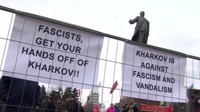 Anti-fascist signs and statue of Lenin