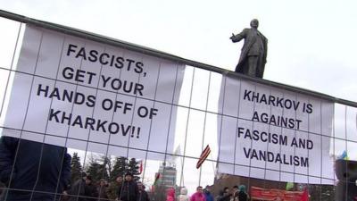 Anti-fascist signs and statue of Lenin