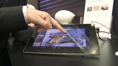 Mark Gregory touches Fujitsu tablet