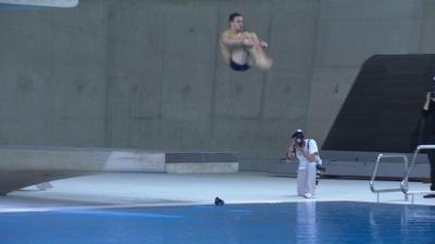 Tom Daley practices a dive