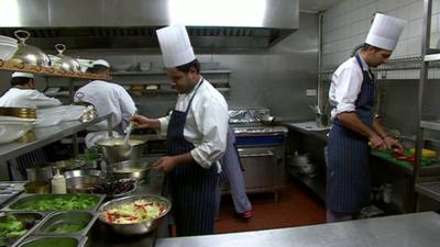 Workers in a kitchen