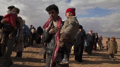Syrian refugees arriving at a camp in Jordan.