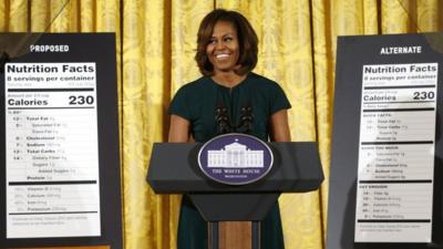 US First Lady Michelle Obama unveils proposed updates to nutrition facts labels during remarks in the East Room of the White House in Washington DC on 27 February 2014