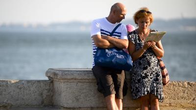 Tourists looking at a map