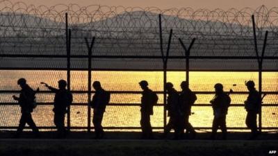 South Korean soldiers patrol the border