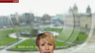 Reporter Caroline Bilton sinking out of shot