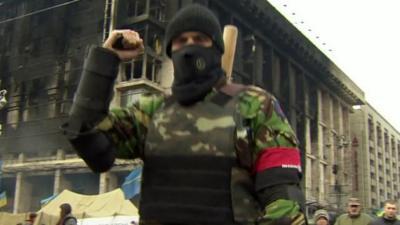 Armed man in uniform in Independence Square