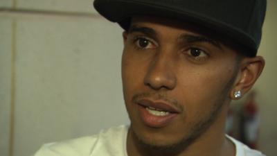 Mercedes driver Lewis Hamilton says he remains upbeat despite reliability problems