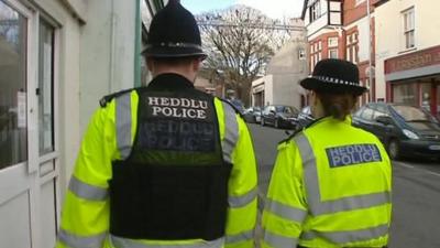 Policeman and woman in Wales