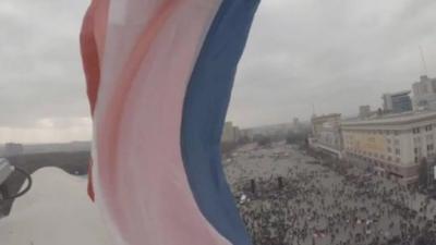 Russian flag flies above square in Kharkiv