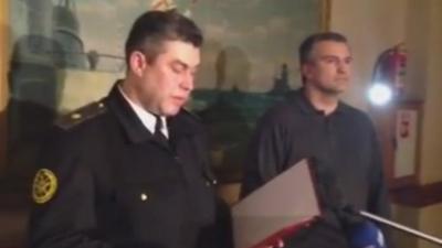 Rear Admiral Denys Berezovsky reads out his oath in Sevastopol alongside Crimea's pro-Russian leader, Sergiy Aksyonov, 2 March