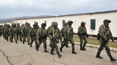 Soldiers surround Ukrainian army base in Crimea. 2 March 2014